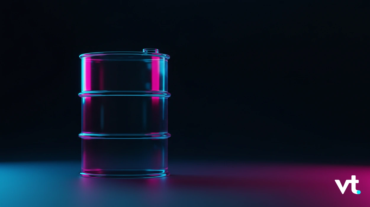 Three stacked metal oil drums illuminated by pink and blue neon lights against a dark background, with the VT logo in the lower-right corner.